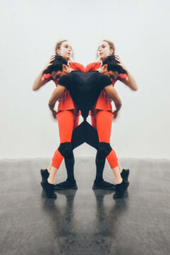 Reflected Photographs of  Touch Performance Artists in the New Museum, New York City