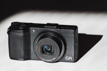 Powered On Ricoh GR smallest lightest fixed prime lens camera with APS-C sensor